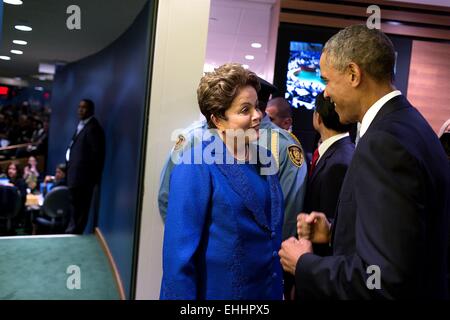 US President Barack Obama greets President Dilma Rousseff of Brazil at the United Nations, prior to addressing the General Assembly September 24, 2014 in New York, N.Y. Stock Photo