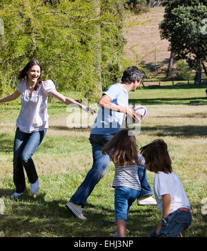 Animated family playing rugby Stock Photo