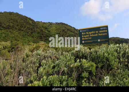 Sign and tourists on Kapiti Island New Zealand Stock Photo