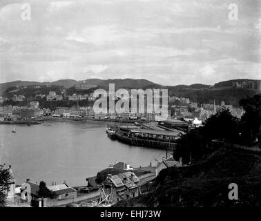 AJAXNETPHOTO - 1911 -12 APPROX. - SCOTTISH PORT - OBAN, ARGYLL IN THE EDWARDIAN ERA. McCAIG'S TOWER, A PARTLY COMPLETED MOCK COLLISEUM COMMISSIONED BY JOHN STUART McCAIG (1824-1902) STANDS ON A HILL ABOVE THE TOWN (LEFT, CENTRE.). PHOTO:AJAX VINTAGE PICTURE LIBRARY REF:()PLA OBAN 1900S 80201 9 Stock Photo