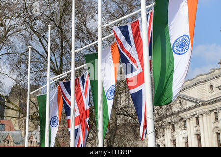 Parliament Square, London, UK. 14th March 2015. British and Indian flags surround the square.  Bronze statue of Mahatma Gandhi by British sculptor Philip Jackson, is unveiled in Parliament Square. Credit:  Matthew Chattle/Alamy Live News Stock Photo