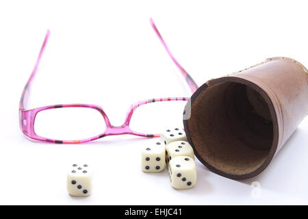 Dice cup with cube Stock Photo
