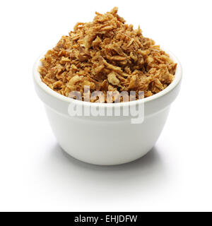 crispy fried onion flakes on white background Stock Photo