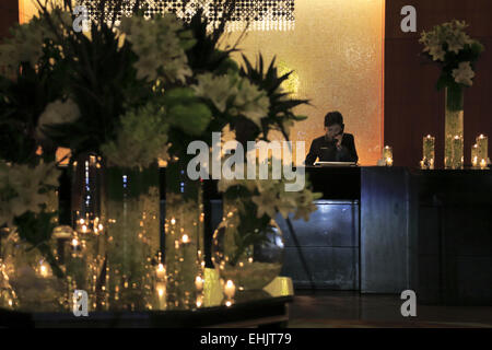 Earth Day energy saving night in the lobby reception of the Four Seasons Hotel Sydney, Sydney Australia Stock Photo