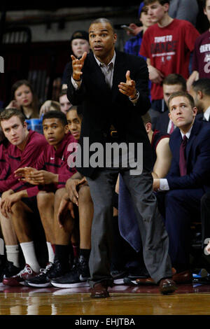 March 14, 2015: Harvard Crimson head coach Tommy Amaker reacts during the NCAA basketball game between the Yale Bulldogs and the Harvard Crimson at the Palestra in Philadelphia, Pennsylvania. The Harvard Crimson won 53-51 to win the Ivy League Playoff game. Stock Photo