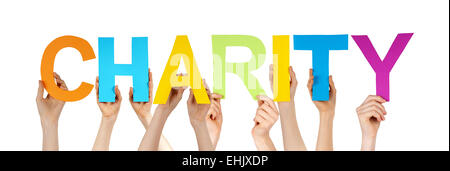 Many Caucasian People And Hands Holding Colorful Straight Letters Or Characters Building The Isolated English Word Charity On Wh Stock Photo