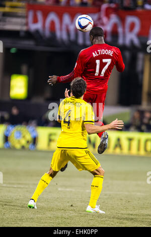 Toronto FC forward Jozy Altidore (17) heads the ball with Columbus Crew SC defender Michael Parkhurst (4) defending during the match between Toronto FC and Columbus Crew SC at MAPFRE Stadium, in Columbus OH. on March 14, 2015. Photo: Dorn Byg/CSM Stock Photo