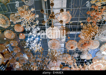 Many beautiful chandeliers light  store Stock Photo