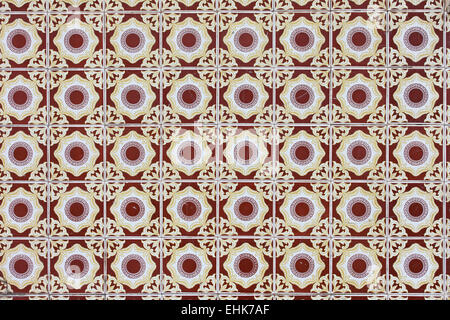 Patterned wall tiles background on an old house facade in Porto, Portugal. Stock Photo