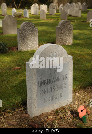 The stone marking the grave on one of the many thousands of unknown German warriors who fell during the Great War WW1. Stock Photo