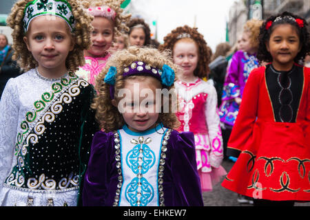 London, March 15th 2015. Hundreds of London's Irish community as well as South and central Americans, Scots and English people of all ages participare in the annual St Patric's Day Procession through the capital to Trafalgar Square. Stock Photo