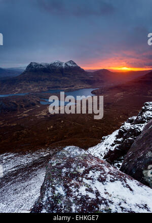 Sunrise behind Cul Mor seen from the summit of Stac Pollaidh Stock Photo
