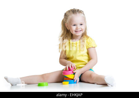 child little girl playing with color toys Stock Photo