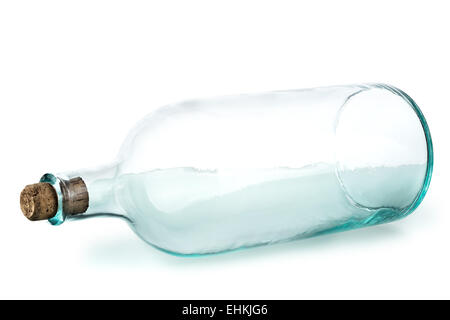 Empty glass bottle with wine cork in it and shadow. Stock Photo