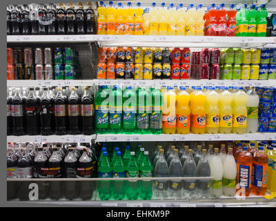 Shelves in a supermarket in Fuerteventura, Canary islands Spain,  selection of bottled and canned soft drinks Stock Photo