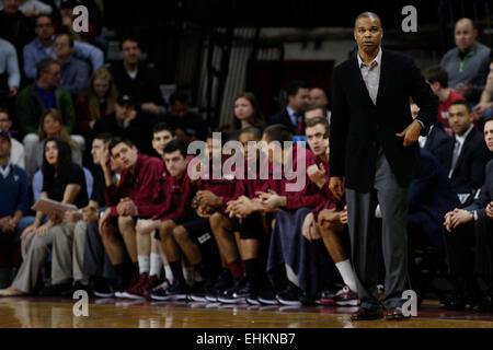 March 14, 2015: Harvard Crimson head coach Tommy Amaker looks on during the NCAA basketball game between the Yale Bulldogs and the Harvard Crimson at the Palestra in Philadelphia, Pennsylvania. The Harvard Crimson won 53-51 to win the Ivy League Playoff game. Stock Photo