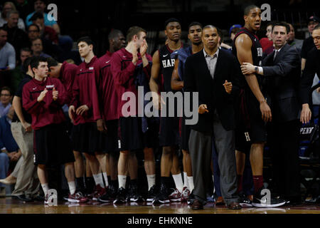 March 14, 2015: Harvard Crimson head coach Tommy Amaker looks on with his team during the NCAA basketball game between the Yale Bulldogs and the Harvard Crimson at the Palestra in Philadelphia, Pennsylvania. The Harvard Crimson won 53-51 to win the Ivy League Playoff game. Stock Photo