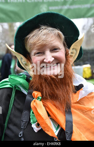 London,UK,15th March 2015 : Hundreds of people attends St Patrick's Day Parade through the streets of London. Irish flags, Irish Dancers and Irish bands made a moving sea of green that paraded from Piccadilly to Whitehall into Trafalgar Square, London. Photo by See Li/Alamy Live News Stock Photo