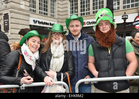 London,UK,15th March 2015 : Hundreds of people attends St Patrick's Day Parade through the streets of London. Irish flags, Irish Dancers and Irish bands made a moving sea of green that paraded from Piccadilly to Whitehall into Trafalgar Square, London. Photo by See Li/Alamy Live News Stock Photo