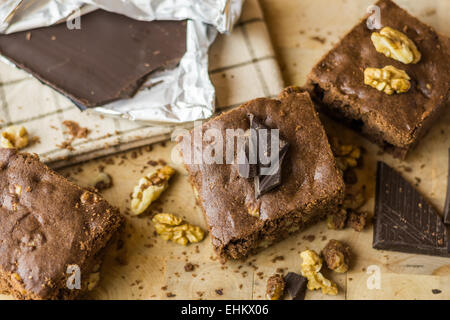 Chocolate Pie with Walnuts on Wooden Table Stock Photo