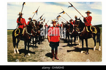 The Royal Canadian Mounted Police (RCMP), members of which are pictured here in this 1930s postcard, was formed in 1920  and serves as Canada's national police force. Stock Photo