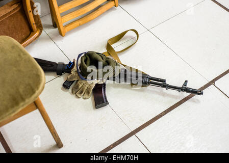 Kiev, Ukraine. 15th Mar, 2015. Kalashnikov gun laying on the floor at training center 'Patriot', Kyiv, Ukraine. 15 of March, 2015. Credit:  Oleksandr Rupeta/Alamy Live News Stock Photo