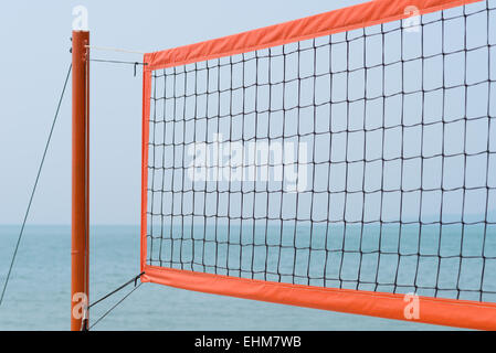 volleyball net at the beach against blue sky Stock Photo