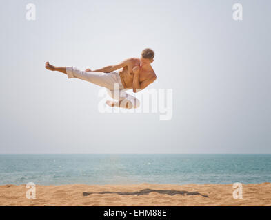 karate jump Stock Photo