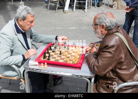 Men playing Chess in Parque Santa Catalina, Las Palmas, Gran Canaria, Canary Islands, Spain Stock Photo
