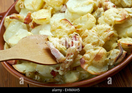 Tartiflette -  French dish from the Savoie and Haute Savoie region. made with potatoes, reblochon cheese, lardons and onions. Stock Photo