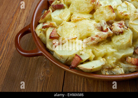 Tartiflette -  French dish from the Savoie and Haute Savoie region. made with potatoes, reblochon cheese, lardons and onions. Stock Photo