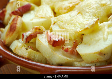 Tartiflette -  French dish from the Savoie and Haute Savoie region. made with potatoes, reblochon cheese, lardons and onions. Stock Photo