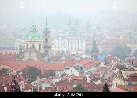 Saint Nicholas' Church in Mala Strana and the Tyn Church in Old Town Square viewed from Petrin Hill in Prague, Czech Republic. Stock Photo