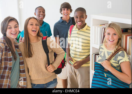 Teenage students smiling at school Stock Photo