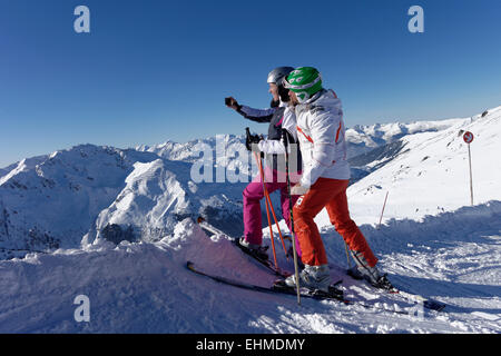 Skiers, couple taking a selfie, Hochfügen in Zillertal valley, Tyrol, Austria Stock Photo