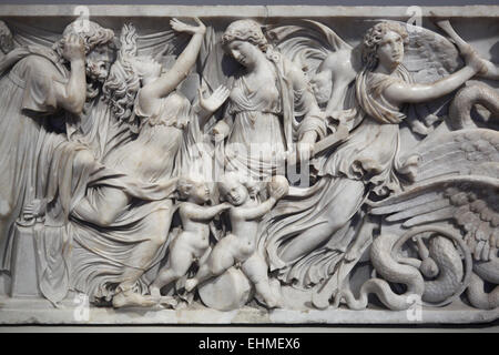 Creusa (Glauce) burning in the garment offered by Medea depicted in the detail of the relief on the Medea Sarcophagus. Roman marble sarcophagus dated from 140-150 AD on display in the Altes Museum in Berlin, Germany. The sarcophagus was found near Porta San Lorenzo in Rome, Italy. Stock Photo