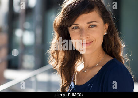 Caucasian woman smiling outdoors Stock Photo