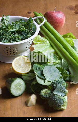 A selection of fruits and vegetables for making a green juice. Stock Photo