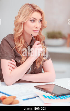 Beautiful young woman surfing in net Stock Photo