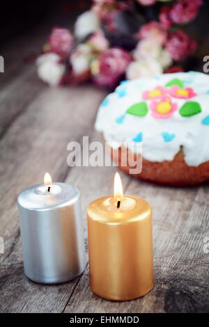 Sweet easter cake and eggs on the table Stock Photo