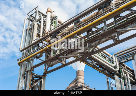 Chemical plant for the treatment of chipboard for furniture factory, with chimney Stock Photo