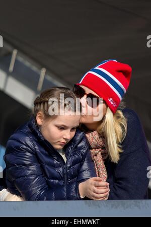 Oslo, Norway. 15th March, 2015. Norwegian Crown Princess Mette-Marit and Princess Ingrid Alexandra attend the Holmenkollen FIS World Cup Nordic in Oslo, Norway, 15-03-2015. Credit:  dpa picture alliance/Alamy Live News Stock Photo