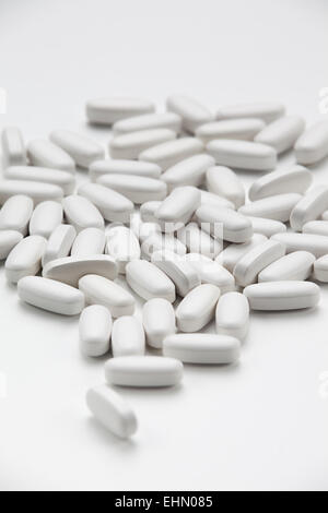 Glucosamine Sulphate pills on a white background Stock Photo