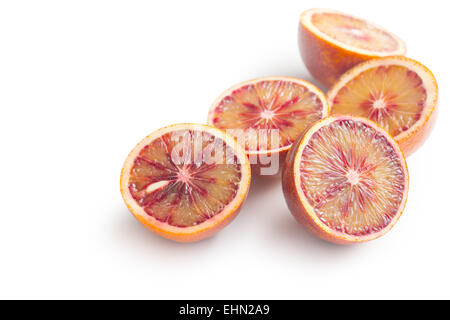 halved blood oranges on white background Stock Photo