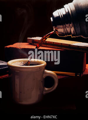 Hot coffee, early morning on a construction set Stock Photo