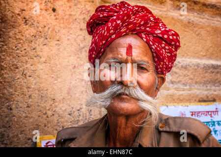 Portrait of a security guard with long mustache in typical Rajasthani turban. Stock Photo