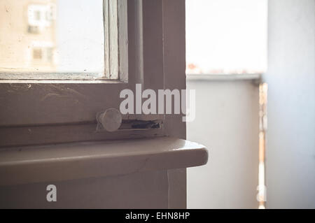 Behind the window, view on terrace entrance, old retro style. Stock Photo