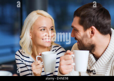 happy couple meeting and drinking tea or coffee Stock Photo