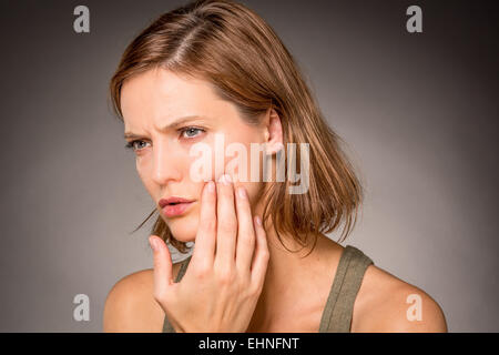Woman suffering from toothache. Stock Photo