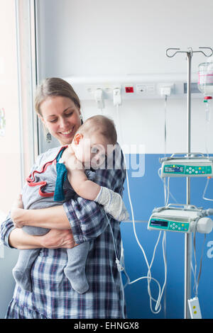 Baby affected by a urinary tract infection (pyelonephritis) hospitalized in the pediatric department of Angoulême hospital, France. Stock Photo